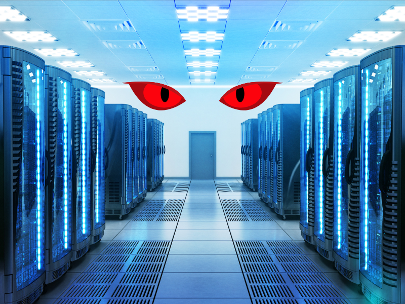 Intimidating data center control room with multiple screens and complex equipment